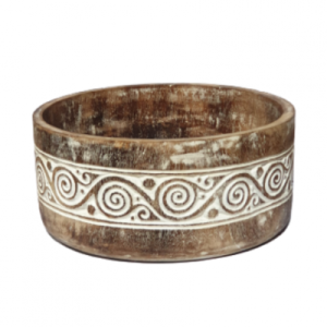 Characterized by its intricate swirl carving pattern, this impressive hand carved Timorese wooden fruit bowl with lid is a stunning piece of artworks in wood carving. This piece of handmade wooden bowl artwork from Timor is a perfect decorative piece for your home interior or perhaps as a beautiful focal points in your outdoor space.
